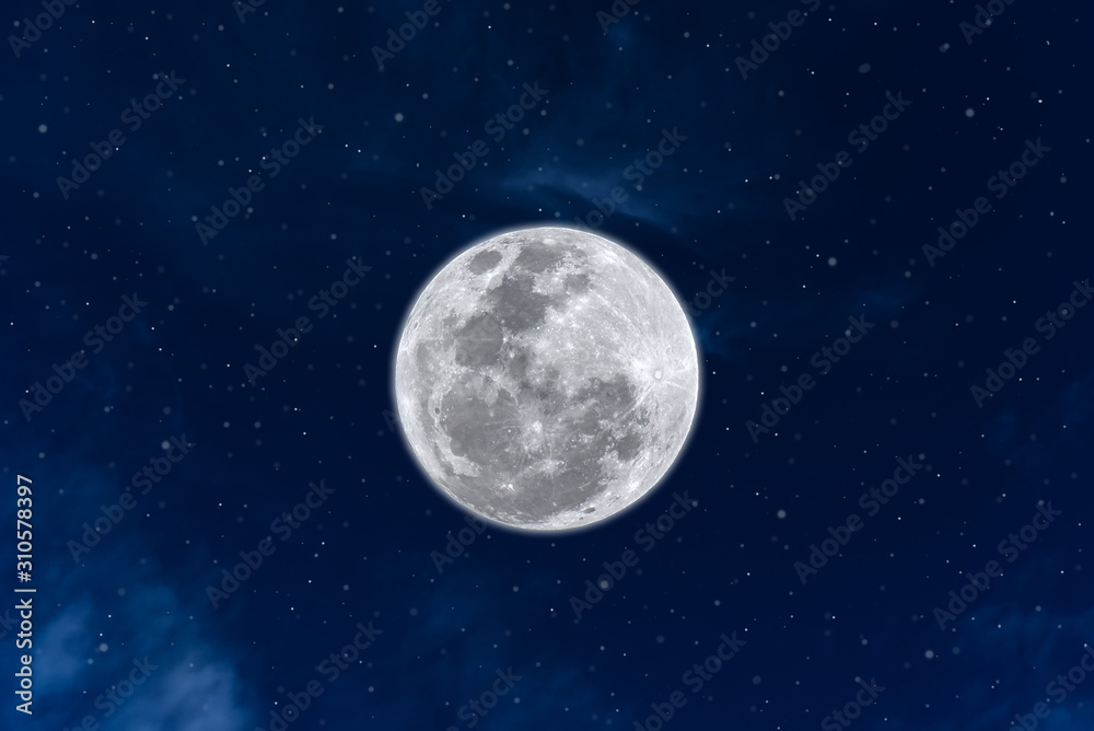 Full moon on blue sky at night.
