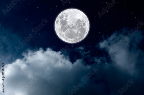 Full moon with clouds in the dark night.