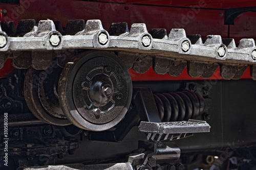 New crawler tractor suspension close up, farming machinery