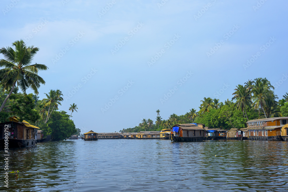 River view and boat in Kerala's Backwaters, India. River view and boat in Kerala's Backwaters, India.