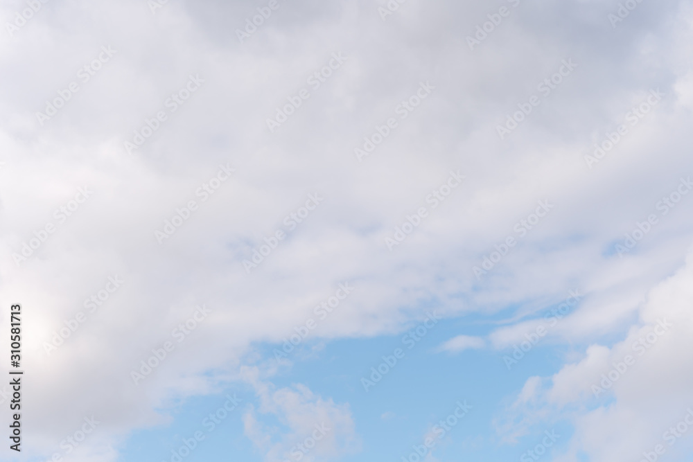 Fototapeta premium Beautiful cirrus clouds on blue sky on a sunny day background texture