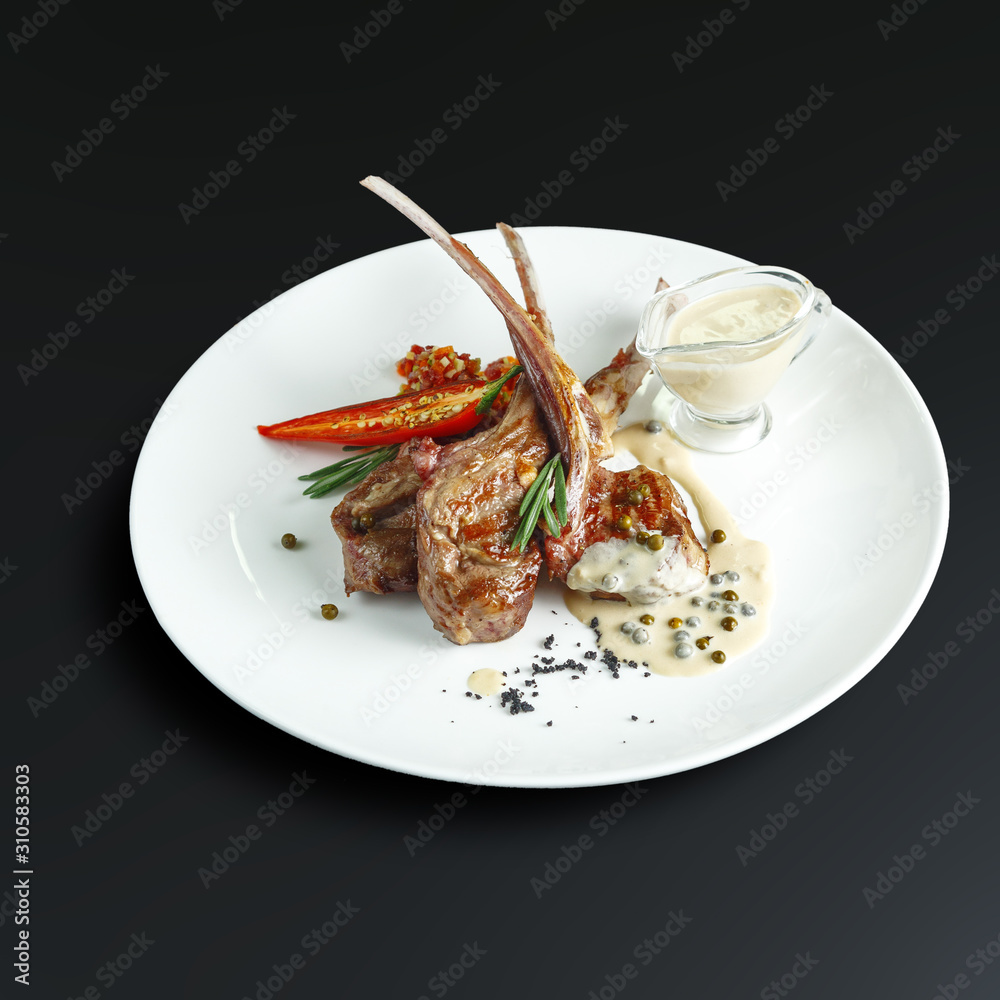 Dishes of traditional Russian cuisine. Restaurant serving. Black background. Dishes of traditional Russian cuisine. Restaurant serving. Black background.