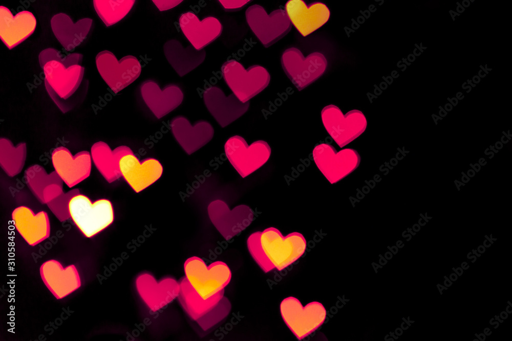 Festive overlay effect. Colorful heart bokeh festive glitter background. Christmas, New Year and Valentine's day design Festive overlay effect. Colorful heart bokeh festive glitter background. Christmas, New Year and Valentine's day design