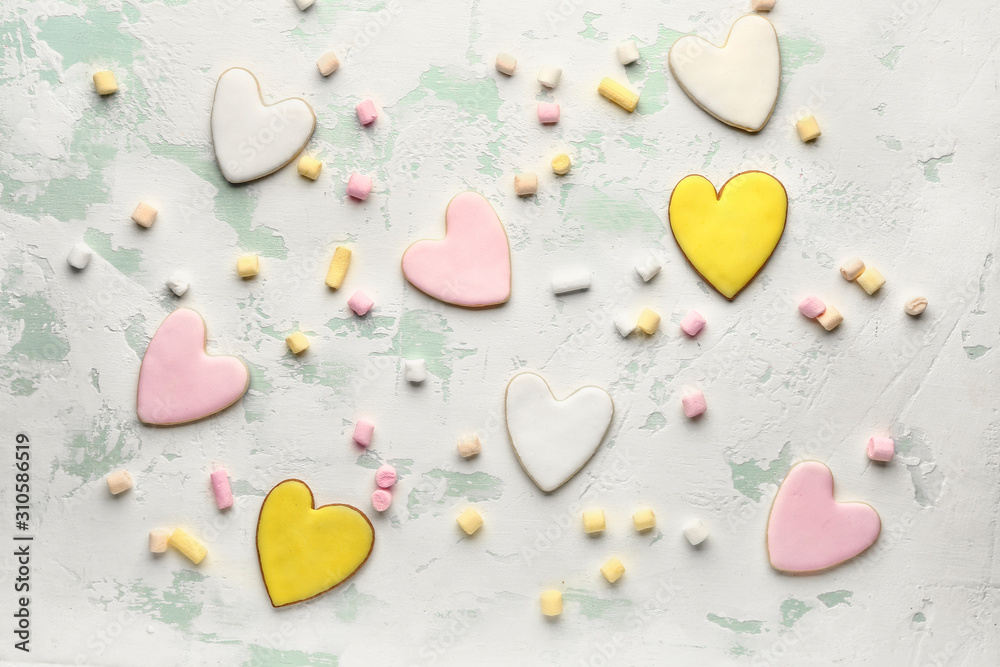 Heart shaped cookies for Valentine's day with marshmallows on white background Heart shaped cookies for Valentine's day with marshmallows on white background