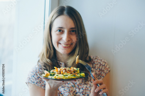 Portrait of a happy girl eating pizza. fast food advertising, pastry, cooking, overeating, diet, Italian food