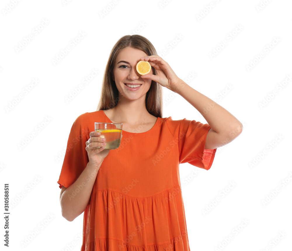 Young woman with glass of lemon water on white background Young woman with glass of lemon water on white background