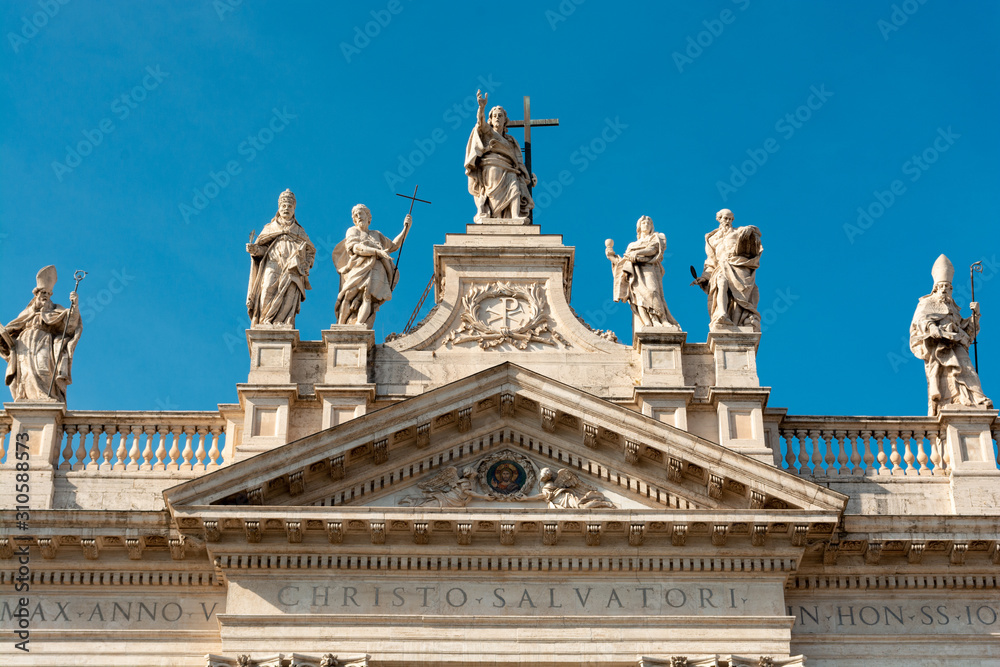 Statues of saints on the top of the Archbasilica of Saint John Lateran