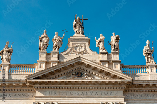 Canvas Print Statues of saints on the top of the Archbasilica of Saint John Lateran