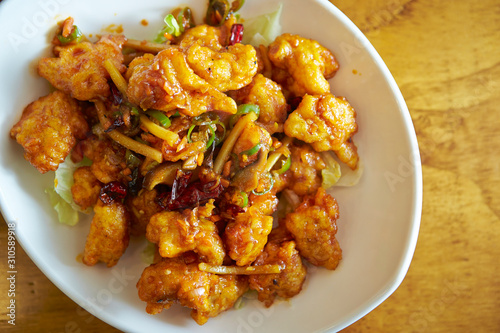 Fried chicken and vegetable with spicy sauce 