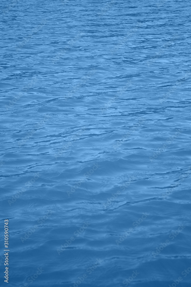 Classic blue 2020. Gradient color palette. Waves on water. Blue water background. Classic blue 2020. Gradient color palette. Waves on water. Blue water background.
