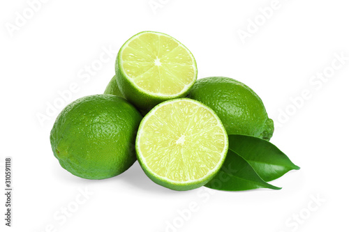 Fresh ripe green limes isolated on white