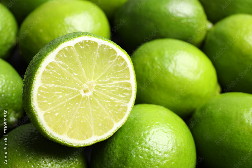 Fresh ripe juicy limes as background, closeup Fresh ripe juicy limes as background, closeup