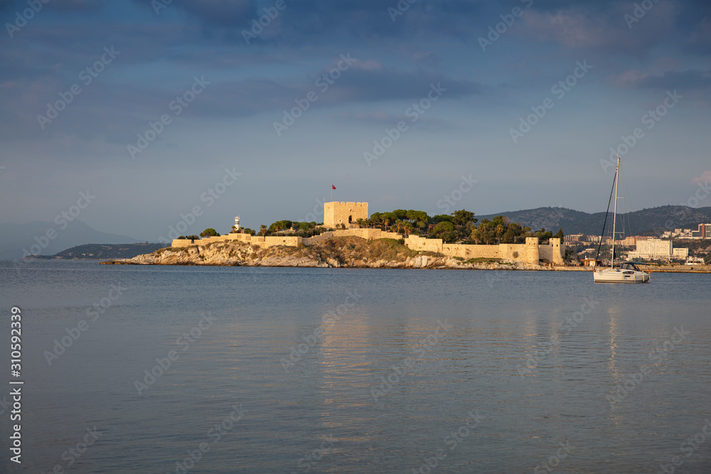 Kusadasi, Turkey. The road goes to Pigeon Island in Kusadasi. Kusadasi is a popular tourist destination in Turkey.