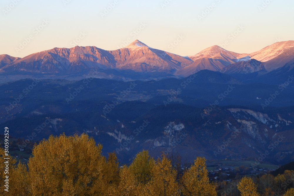 Hills during sunrise in mountain valley. Beautiful natural landscape