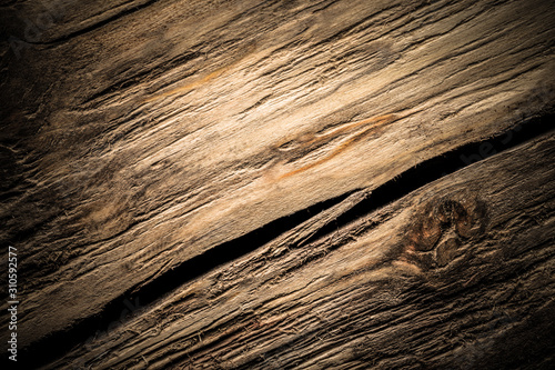 Surface of old textured wooden board for background. Toned