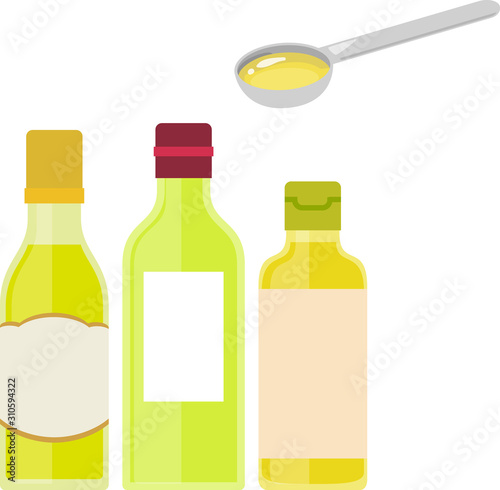 ビン入りの食用油とスプーン