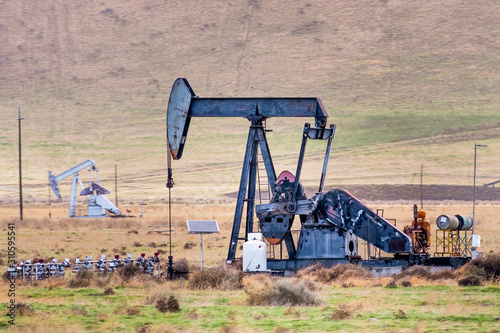 Oil pump operating on the Kern County petroleum field, Bakersfield, California