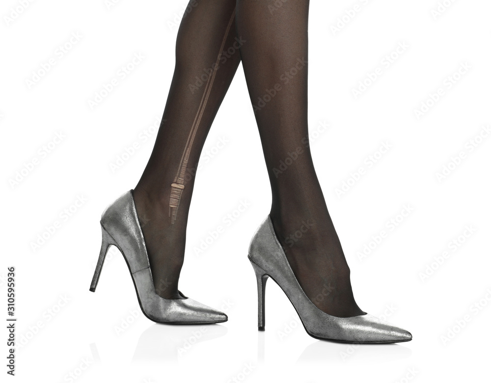 Woman wearing torn tights on white background, closeup Woman wearing torn tights on white background, closeup