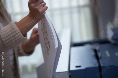 Production and gluing of books.