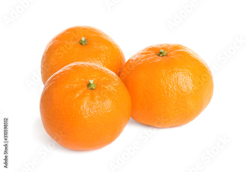 Fresh ripe juicy tangerines isolated on white