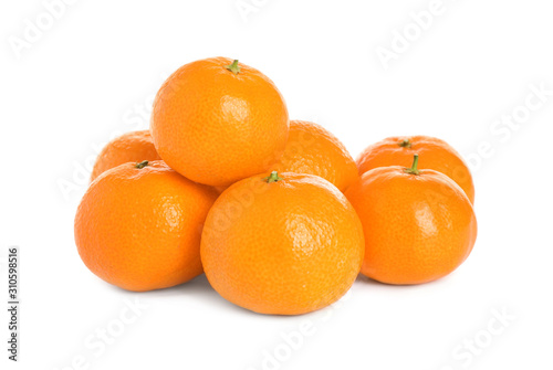 Pile of fresh juicy tangerines isolated on white