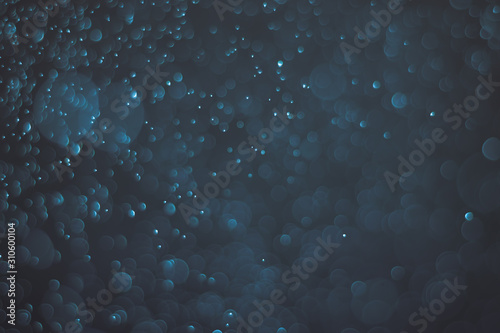 Abstract bokeh lights with light Blue background, beautiful bokeh from water droplets
