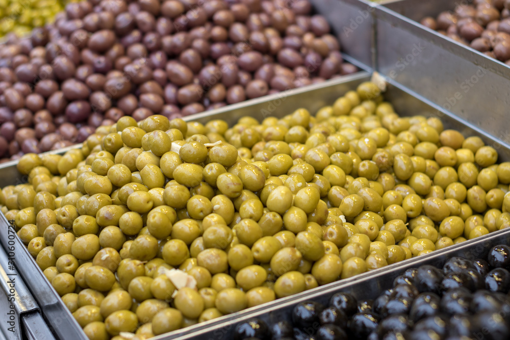 Olives. Of all varieties and in all shapes! Blacks, greens, bigs, little ones, Syrians, Arabs, bloody, conquered, and skulls. Kosher Food, Mahane Yehuda Market, Jerusalem, Israel.