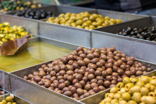 Olives. Of all varieties and in all shapes! Blacks, greens, bigs, little ones, Syrians, Arabs, bloody, conquered, and skulls. Kosher Food, Mahane Yehuda Market, Jerusalem, Israel.