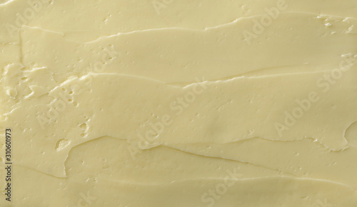 Yellow butter surface background and texture