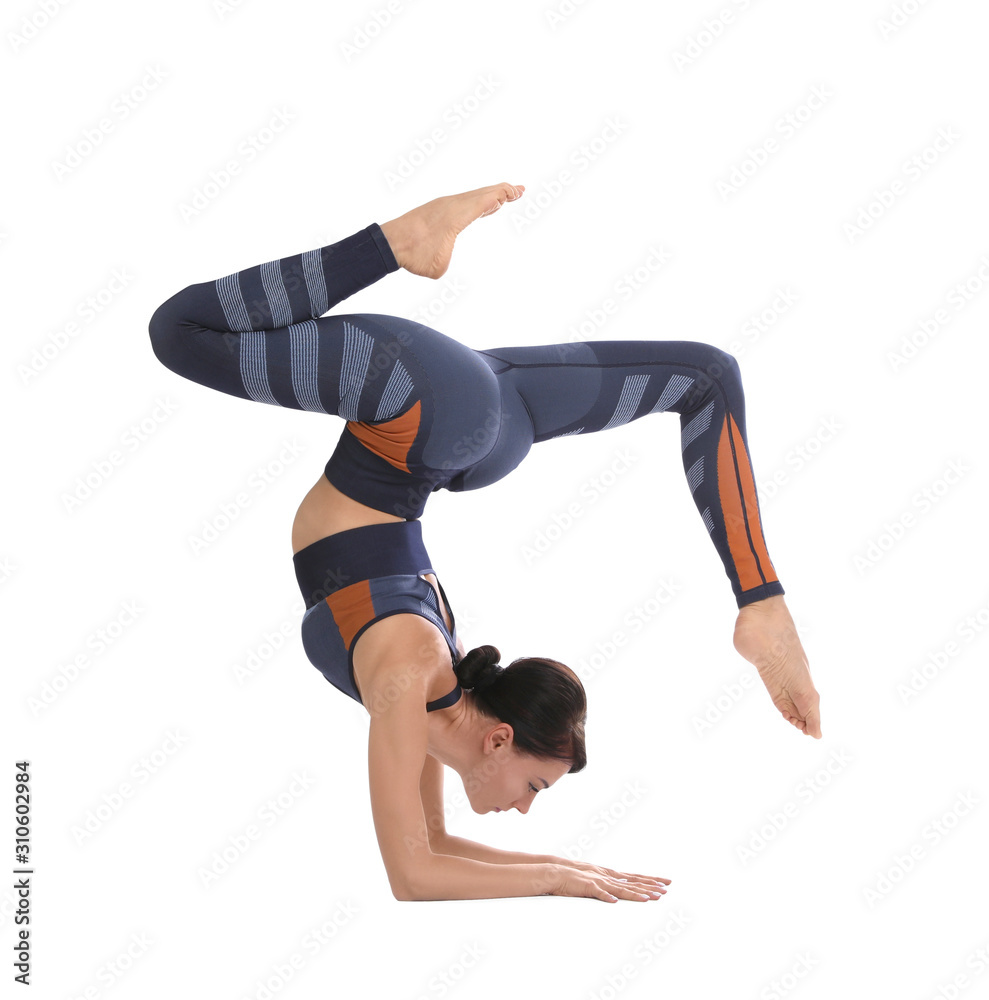 Professional young acrobat exercising on white background Professional young acrobat exercising on white background