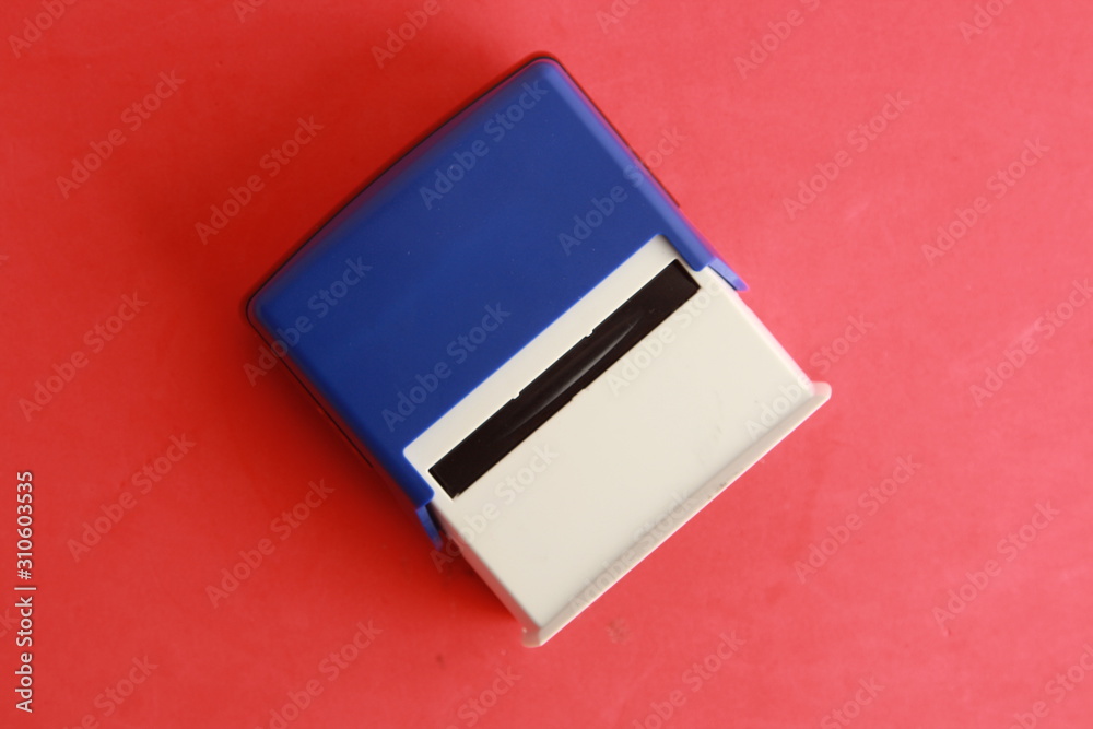 Automatic ink stamp manufactured in blue plastic Automatic ink stamp manufactured in blue plastic