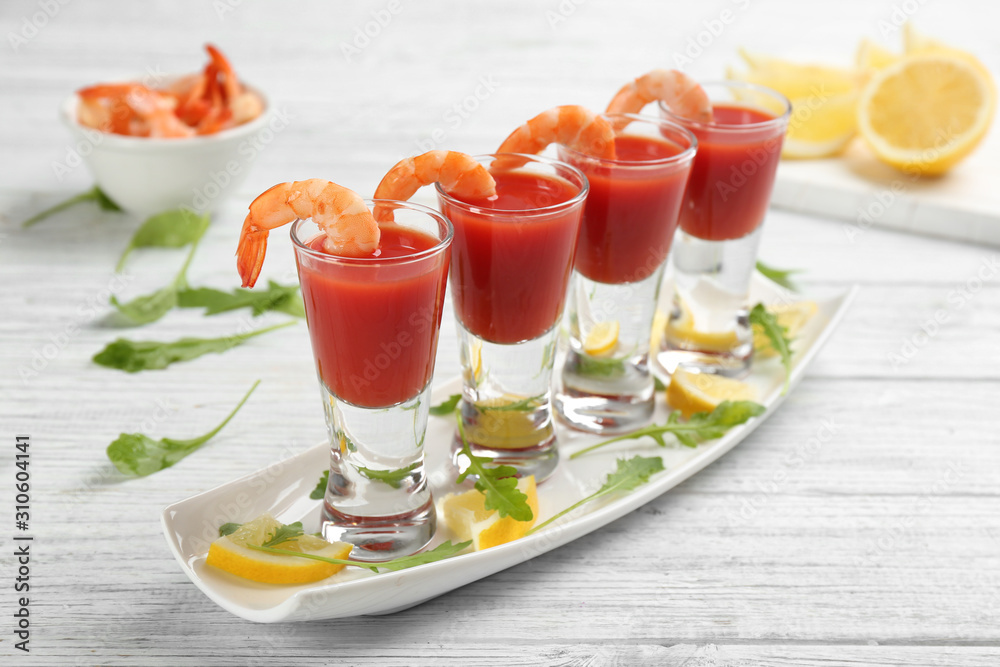 Shrimp cocktail with tomato sauce on white wooden table Shrimp cocktail with tomato sauce on white wooden table