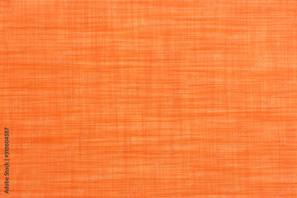 Fototapeta premium the orange synthetic fabric texture background