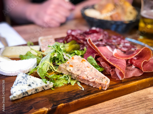 delicious french charcuterie plate with fresh ingredients