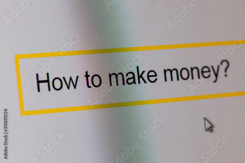 Words How to make money? in search bar on computer monitor
