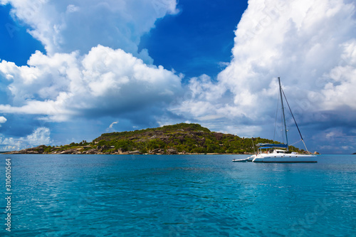 Tropical island at Seychelles and boats