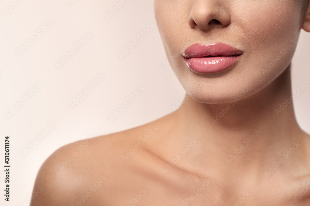 Woman with pink lipstick on light background, closeup Woman with pink lipstick on light background, closeup