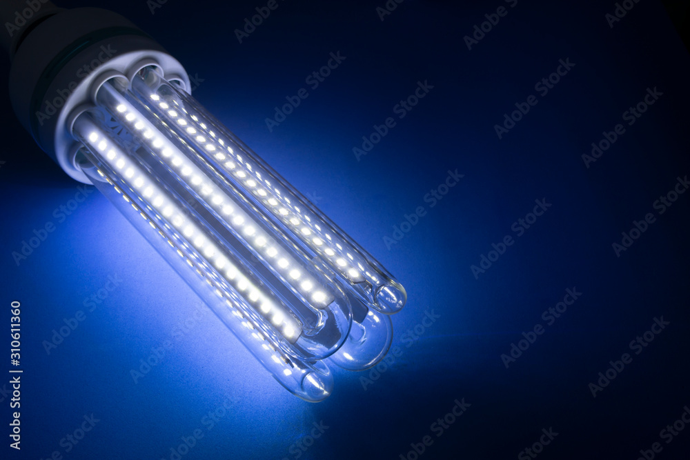 Led light bulb on blue background with copy space Led light bulb on blue background with copy space