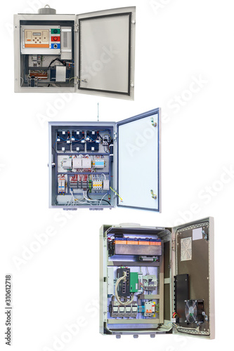 three electrical control Cabinet with an open door isolated on a white background