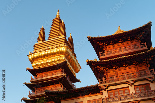 Photography Golden Temples Roof Top Jing An Tranquility Temple Shanghai China with blue sky background, Richest buddhist temple in Shanghai