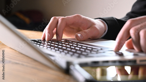 Businessman working with computer devices