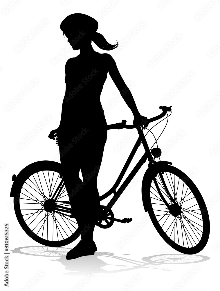 Bicyclist riding their bike and wearing a safety helmet in silhouette