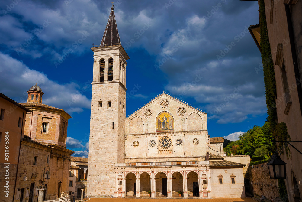 The wonderful Spoleto Cathedral, a city landmark completed in the 13th century, with clouds above