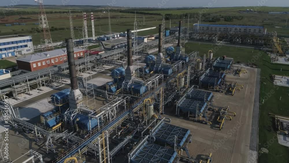 4K Aerial shot from oil tanks and towers in a refinery 4K Aerial shot from oil tanks and towers in a refinery