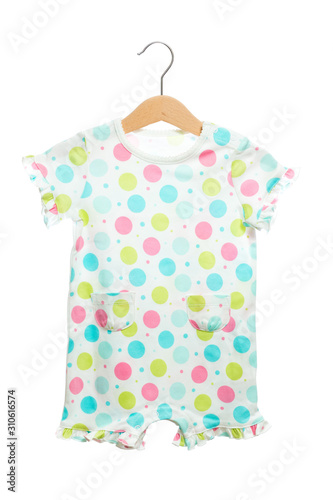 polka dot pink green blue on white baby clothes bodysuit front view in clothes hanger, isolated on white background.