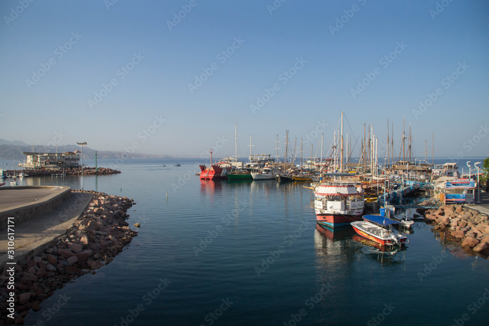 Fototapeta premium Boats in Eilat marina in the morning, Israel