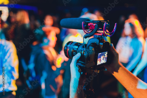 Videographer with gimball video dslr, Professional video, Videographer in event. photo