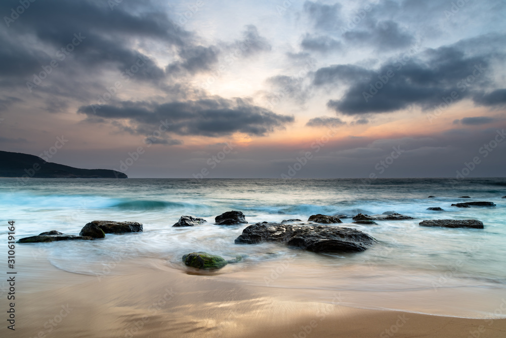 Summer Sunrise with  Smoky Haze and Clouds at the Seaside