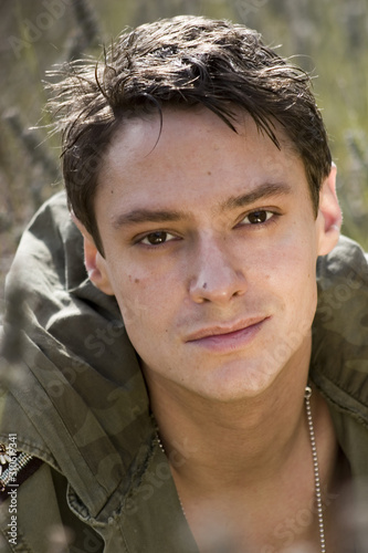 Portrait of a young man is army clothes