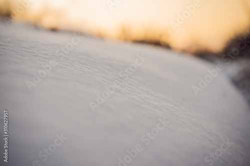 Pure white pristine snow. Texture of white snow with shadows